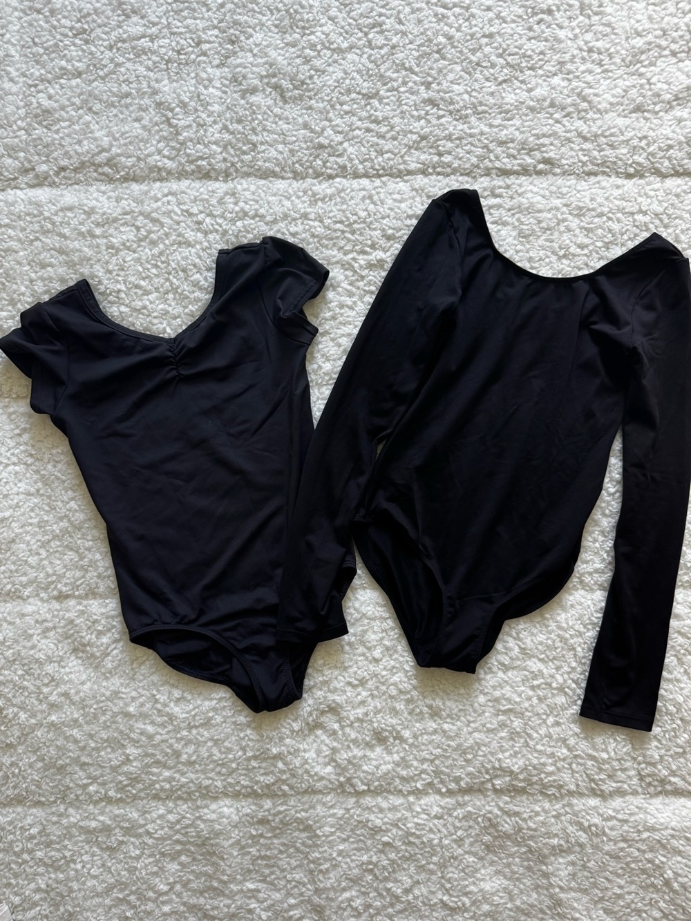 Set of girls black leotards